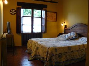 Cama o camas de una habitación en Posada La Villanita
