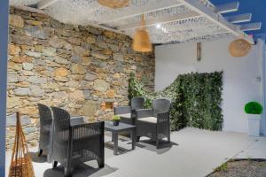 A seating area at Endless Blue from Syros - Megas Gialos Resort - Suite 1