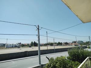 a view of an empty parking lot with a road at Casa do Campo in Seia