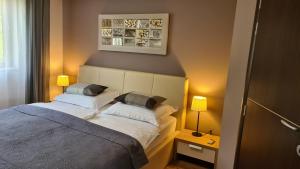 Postel nebo postele na pokoji v ubytování Villa Amalia Apartments