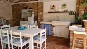 Kuchyň nebo kuchyňský kout v ubytování Villa Amalia Apartments