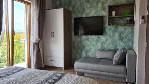 Postel nebo postele na pokoji v ubytování Villa Amalia Apartments