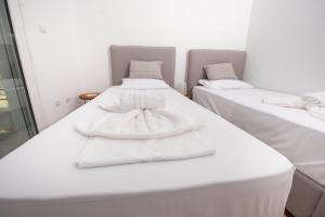 Posteľ alebo postele v izbe v ubytovaní Brand new maisonette in Chanioti, Chalkidiki
