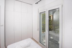 Posteľ alebo postele v izbe v ubytovaní Brand new maisonette in Chanioti, Chalkidiki