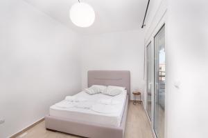 Posteľ alebo postele v izbe v ubytovaní Brand new maisonette in Chanioti, Chalkidiki