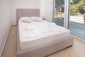 Posteľ alebo postele v izbe v ubytovaní Brand new maisonette in Chanioti, Chalkidiki