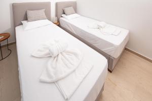 Posteľ alebo postele v izbe v ubytovaní Brand new maisonette in Chanioti, Chalkidiki