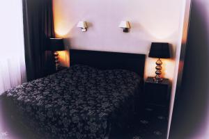 Postel nebo postele na pokoji v ubytování Hotel Felicia
