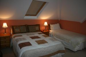 Rúm í herbergi á Avarest Bunratty B&B