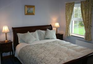 Postel nebo postele na pokoji v ubytování Avarest Bunratty B&B