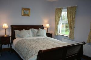 Rúm í herbergi á Avarest Bunratty B&B