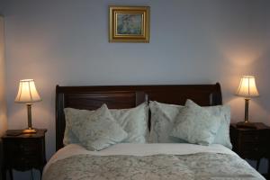 Postel nebo postele na pokoji v ubytování Avarest Bunratty B&B + 9 fotografií