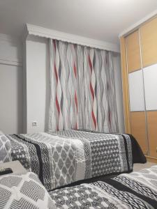 Postel nebo postele na pokoji v ubytování Hostal la Campana
