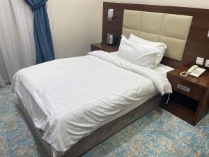 Postel nebo postele na pokoji v ubytování Hotel Berg Rappeg