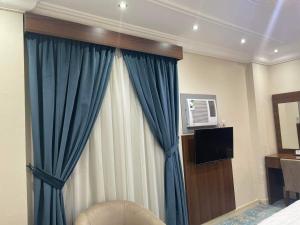 TV a/nebo společenská místnost v ubytování Hotel Berg Rappeg