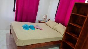 Postel nebo postele na pokoji v ubytování Babas Guesthouse