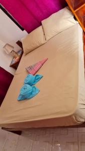 Postel nebo postele na pokoji v ubytování Babas Guesthouse
