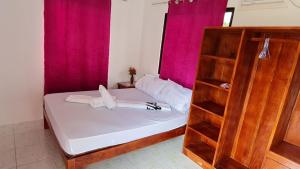 Postel nebo postele na pokoji v ubytování Babas Guesthouse