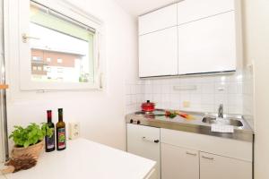 Kuchyňa alebo kuchynka v ubytovaní Familienhotel Kleinwalsertal