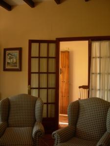 A seating area at Casa rural Villa Manuela