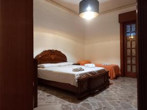 Posteľ alebo postele v izbe v ubytovaní Casa Tortona