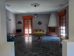 Posedenie v ubytovaní Casa Tortona