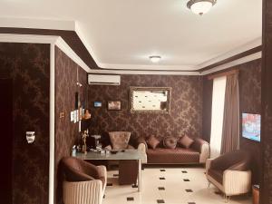 TV a/nebo společenská místnost v ubytování Hotel RichI G A