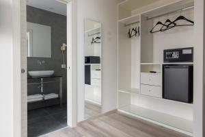 Kuchyň nebo kuchyňský kout v ubytování Hotel President