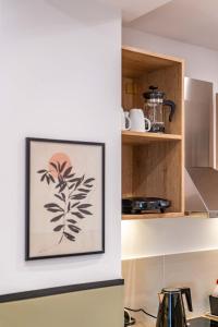 A kitchen or kitchenette at Mar25 by Smart Cozy Suites - In the heart of Athens - 9 minutes from metro - Available 24hr