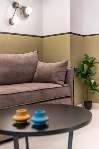 A seating area at Mar25 by Smart Cozy Suites - In the heart of Athens - 9 minutes from metro - Available 24hr