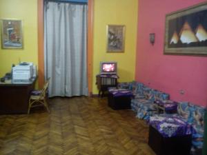 TV a/nebo společenská místnost v ubytování African House Hostel
