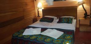 Ein Bett oder Betten in einem Zimmer der Unterkunft Roça Monte Forte