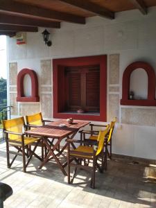 A patio or other outdoor area at Magnolia Traditional Stone House in Vamvakou