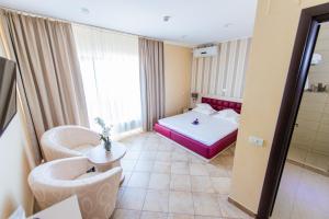 Кровать или кровати в номере Hotel Prestige