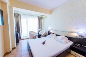 Кровать или кровати в номере Hotel Prestige