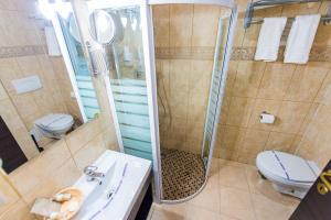 Ванная комната в Hotel Prestige