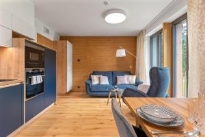 Kuchyň nebo kuchyňský kout v ubytování Residence Koubek - Útulný apartmán s výhledem a parkováním