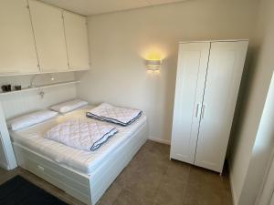 Ένα ή περισσότερα κρεβάτια σε δωμάτιο στο Haus Lith - Fewo 9