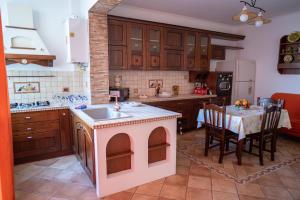 Kuchyň nebo kuchyňský kout v ubytování Casa da Stefy