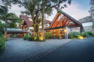 a large building with a lot of windows at Bavaria Sport Hotel in Gramado