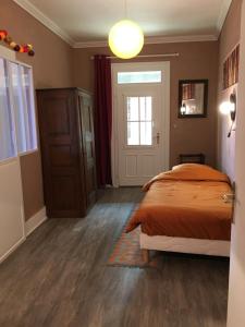 Posteľ alebo postele v izbe v ubytovaní Au Relais de l'Histoire Gîte classé 4 étoiles