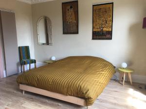Posteľ alebo postele v izbe v ubytovaní Au Relais de l'Histoire Gîte classé 4 étoiles