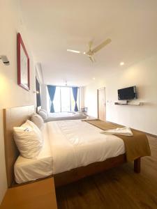 Postel nebo postele na pokoji v ubytování Hotel Bluestone + 18 fotografií