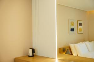 Postel nebo postele na pokoji v ubytování Hotel Pico