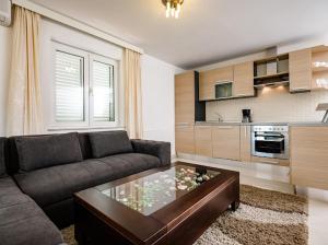 Kuchyň nebo kuchyňský kout v ubytování Apartments Villa Slavica