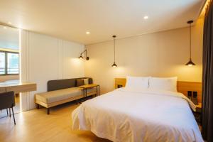Postel nebo postele na pokoji v ubytování Hotel Pico