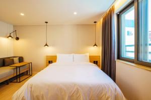 Postel nebo postele na pokoji v ubytování Hotel Pico