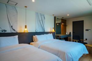 Postel nebo postele na pokoji v ubytování Hotel Pico