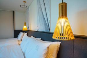Postel nebo postele na pokoji v ubytování Hotel Pico