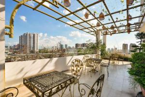 Μπαλκόνι ή βεράντα στο Happy Life Hotel District 7 Gần SECC